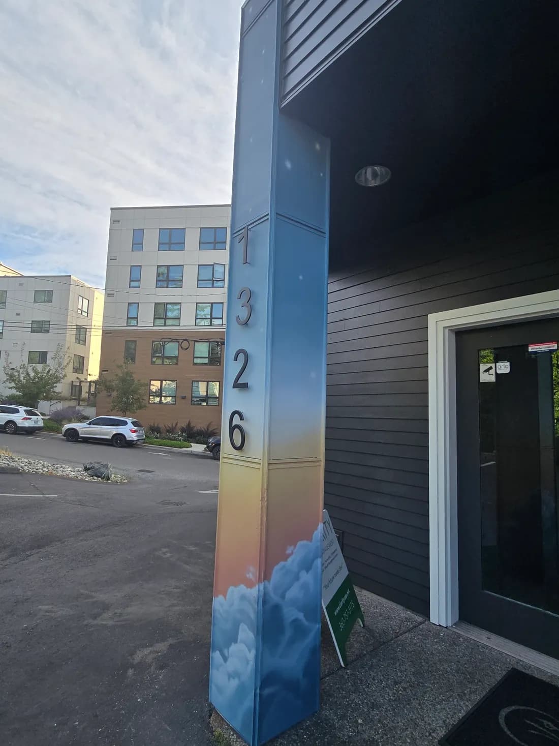 The painted 1326 address pillar marking the entrance to the Clarity Tax & CPAs office on E Laurel Street in Bellingham